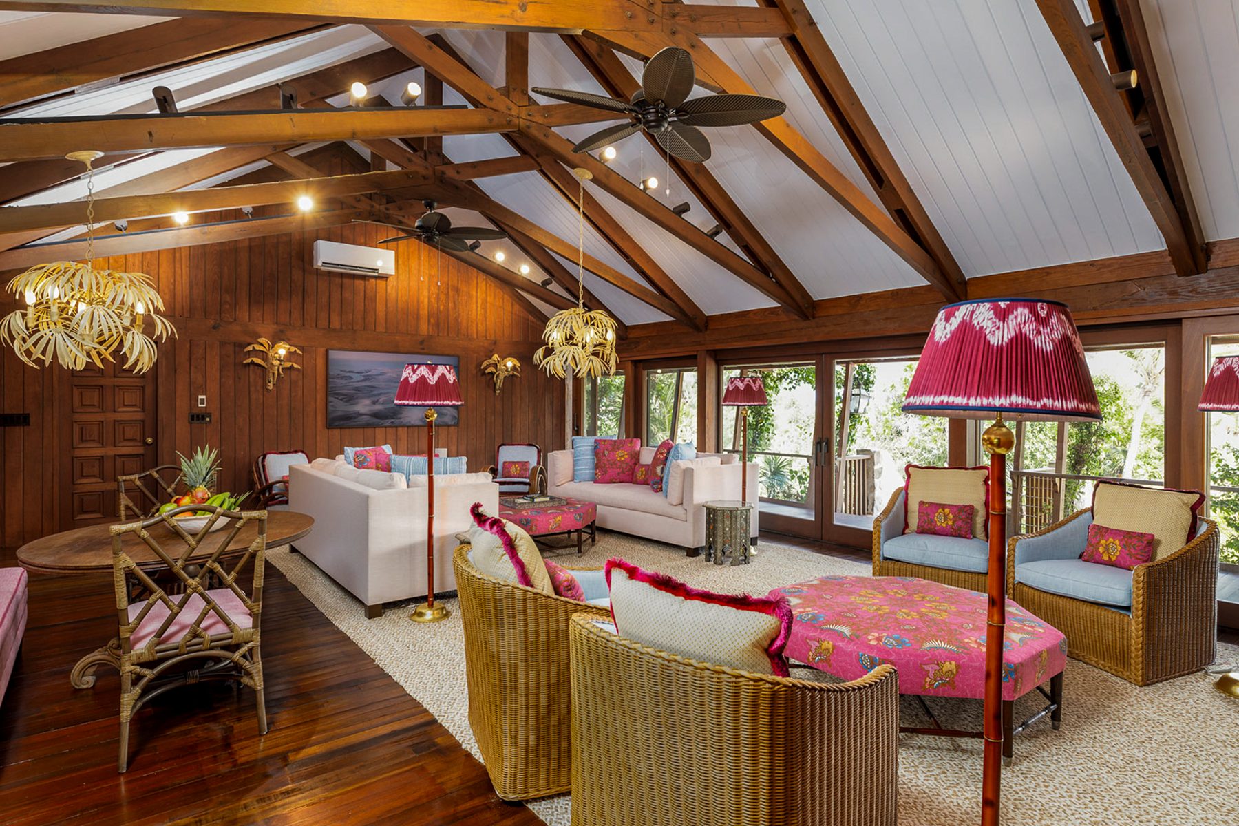 The main living room at Flight Central, with vaulted timber ceiling and chandeliers
