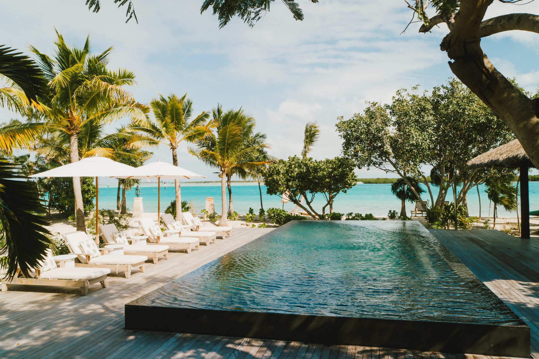 The infinity pool and deck at Flight Central, looking out over the Leeward channel